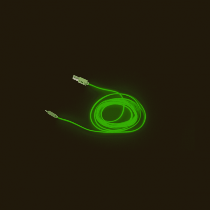 Green USB data cable, glowing in the dark